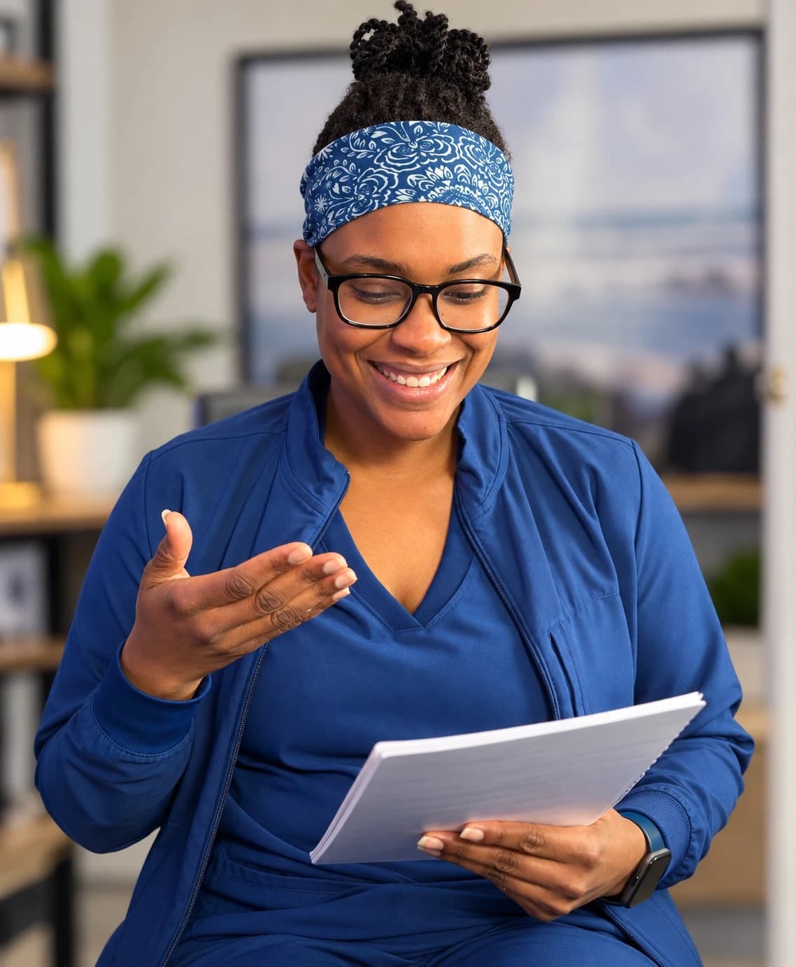 Francesca Prophete, RN, going over a patient’s instructions with a notebook in hand